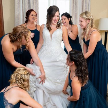 Bride and bridesmaids getting ready