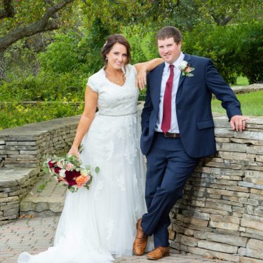 Bride and groom in stone garden