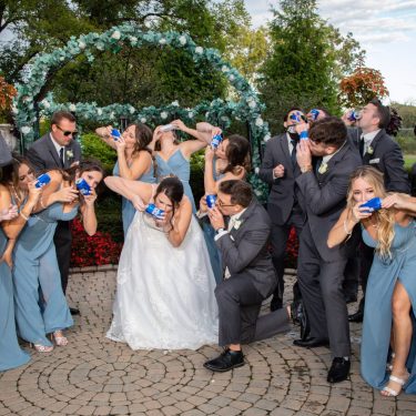 Bridal party drinking beers