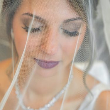 Bride with veil over face