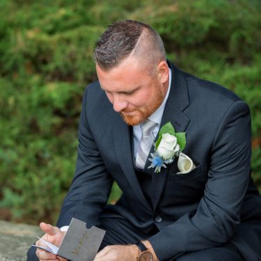 Groom reading vows