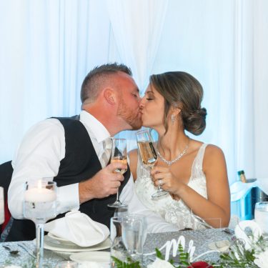 Bride and groom toasting