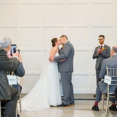Married couple kissing