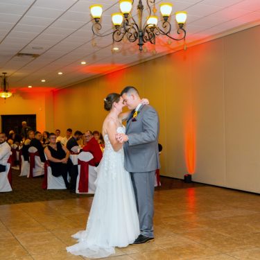Married couple dancing on dance floor