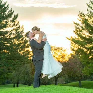 Married couple kissing