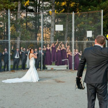Bridal party playing softball in MI