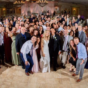 Group of wedding guest on dance floor in MI