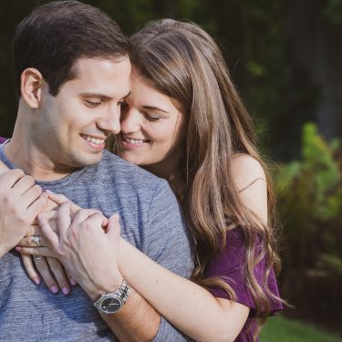 Engaged couple in park