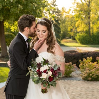 Married coupled in outside garden in MI